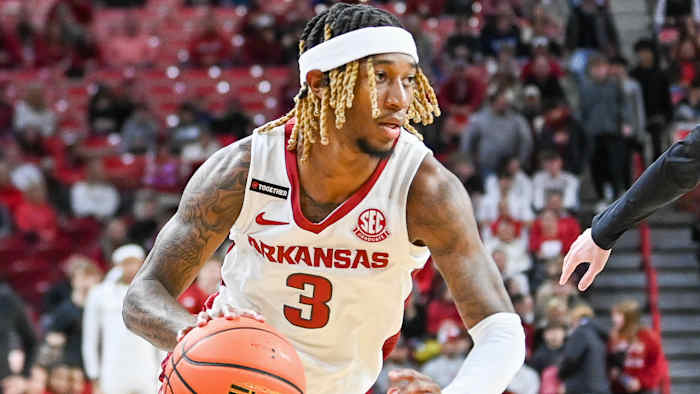 Razorbacks El Ellis brings ball up the court against Texas A&M